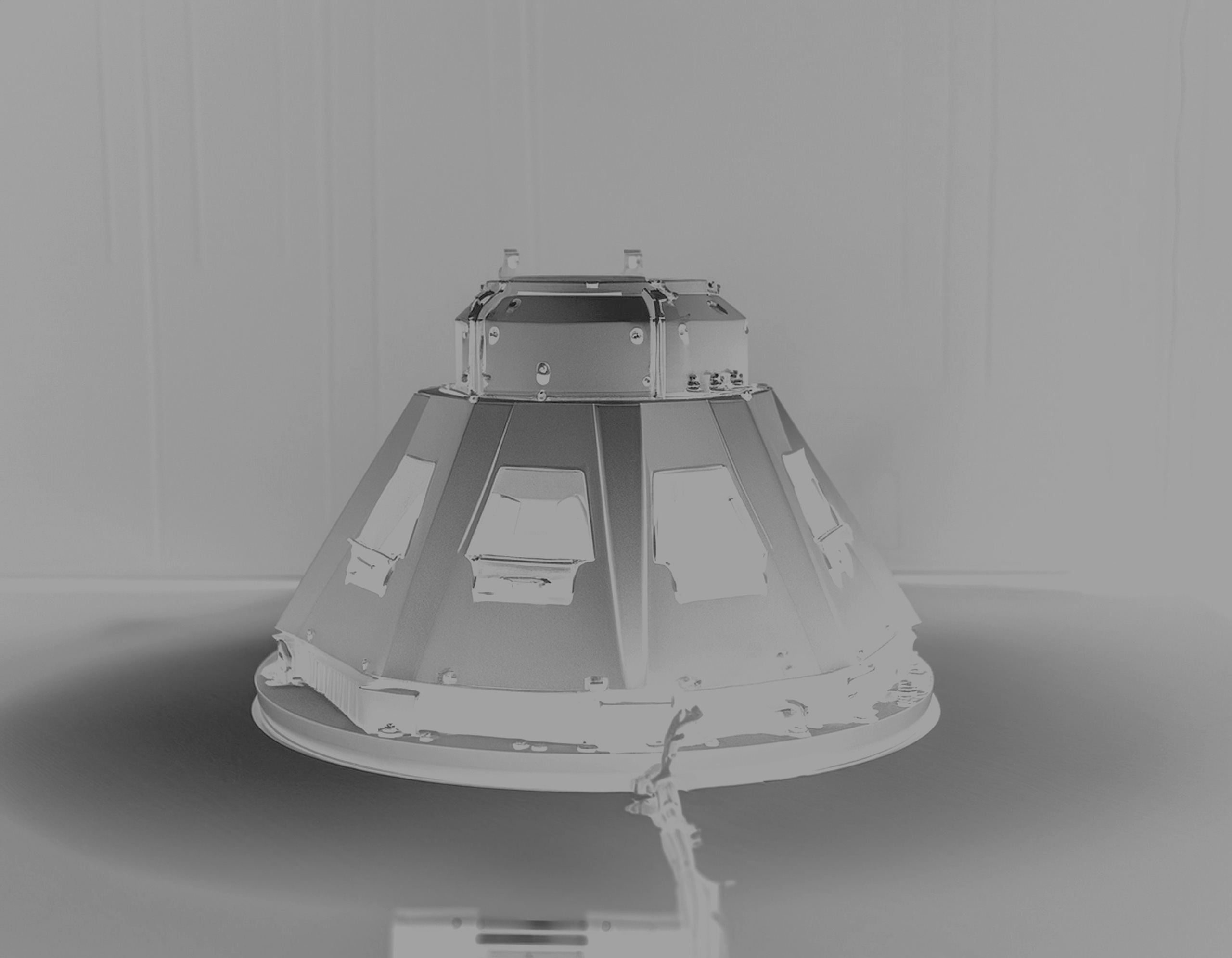 Spaceship resting on the ground, grayscale image